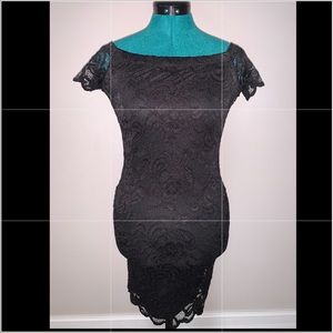 Black, form fitting lace mini dress